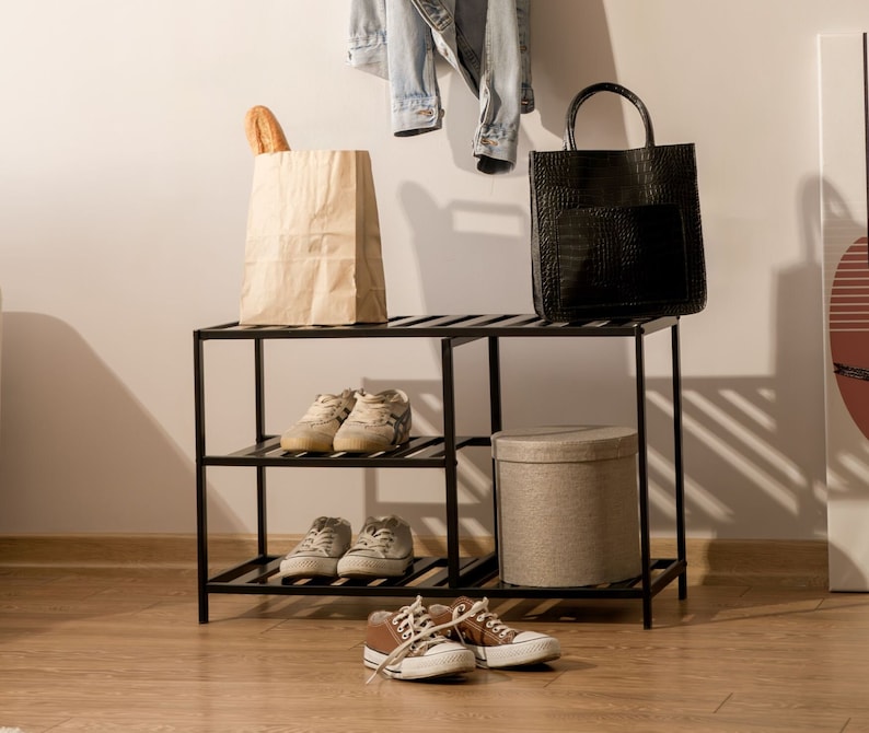 3-tier metal shoe rack in entryway