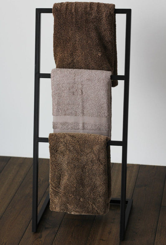3-tier metal towel stand in bathroom