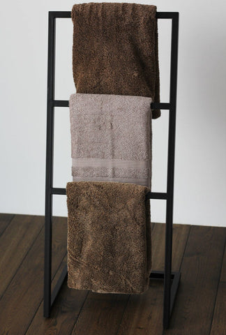 3-tier metal towel stand in bathroom