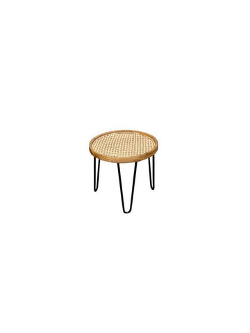 "Antique-finish wood and rattan nesting table detail"
