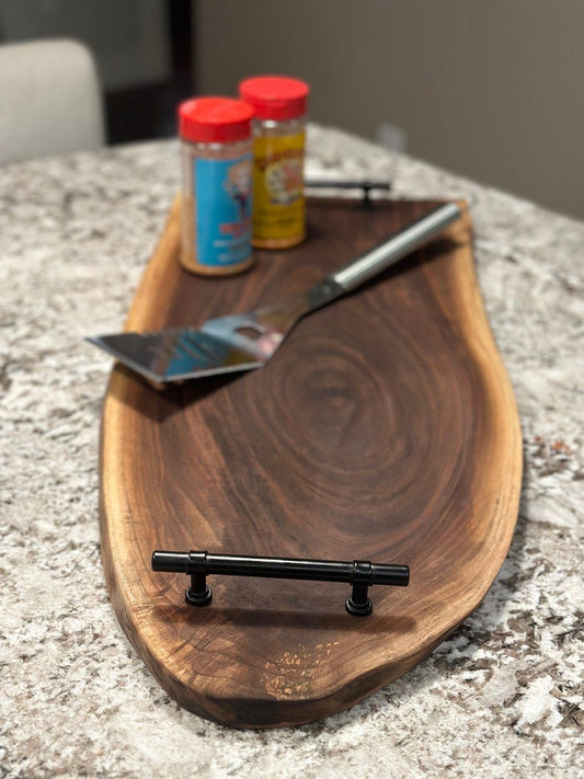 Black sheesham live edge serving board with metal handles