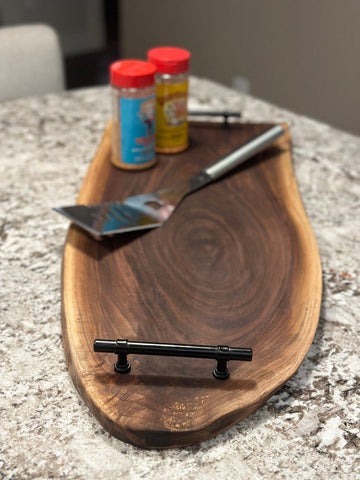 Black sheesham live edge serving board with metal handles
