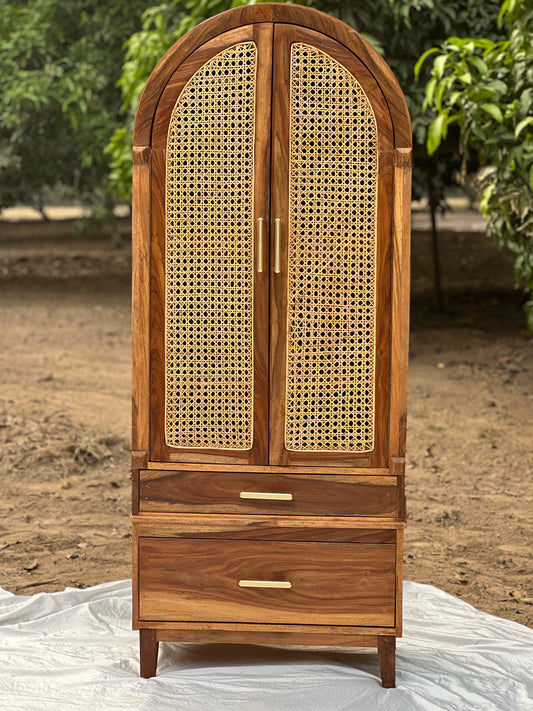"Cane cupboard front view showing door panels"
