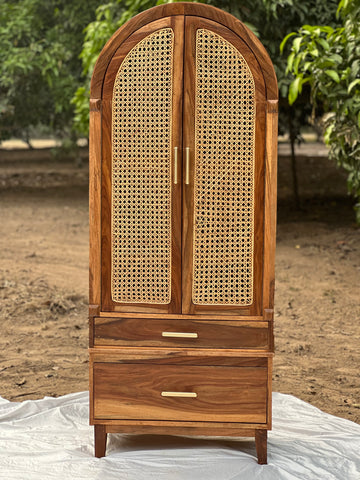 "Cane cupboard front view showing door panels"