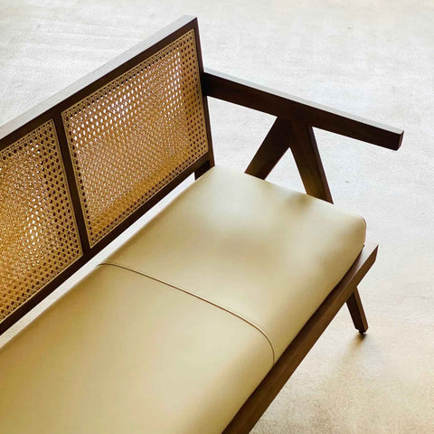 Close-up of hand-woven rattan seating surface