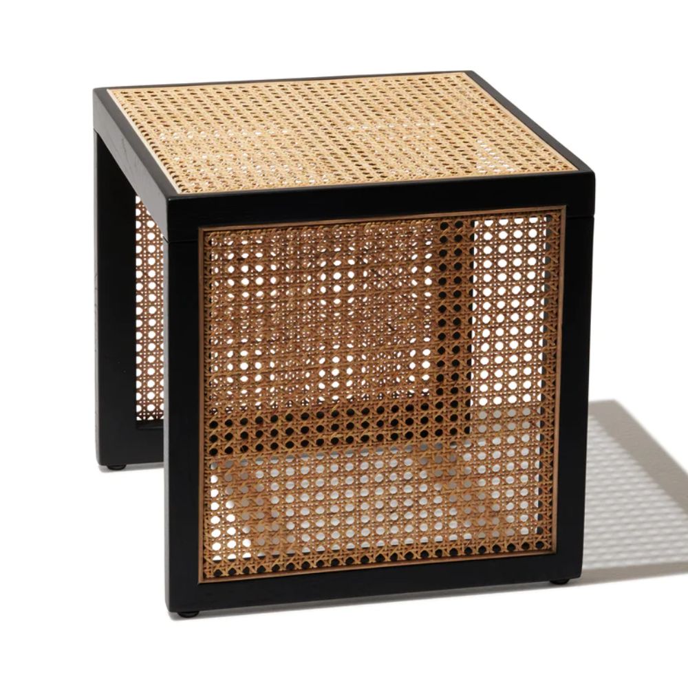 "Close-up of handwoven rattan weave on nesting table"