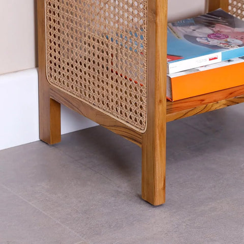 "Close-up of open weave rattan mesh on side table top"