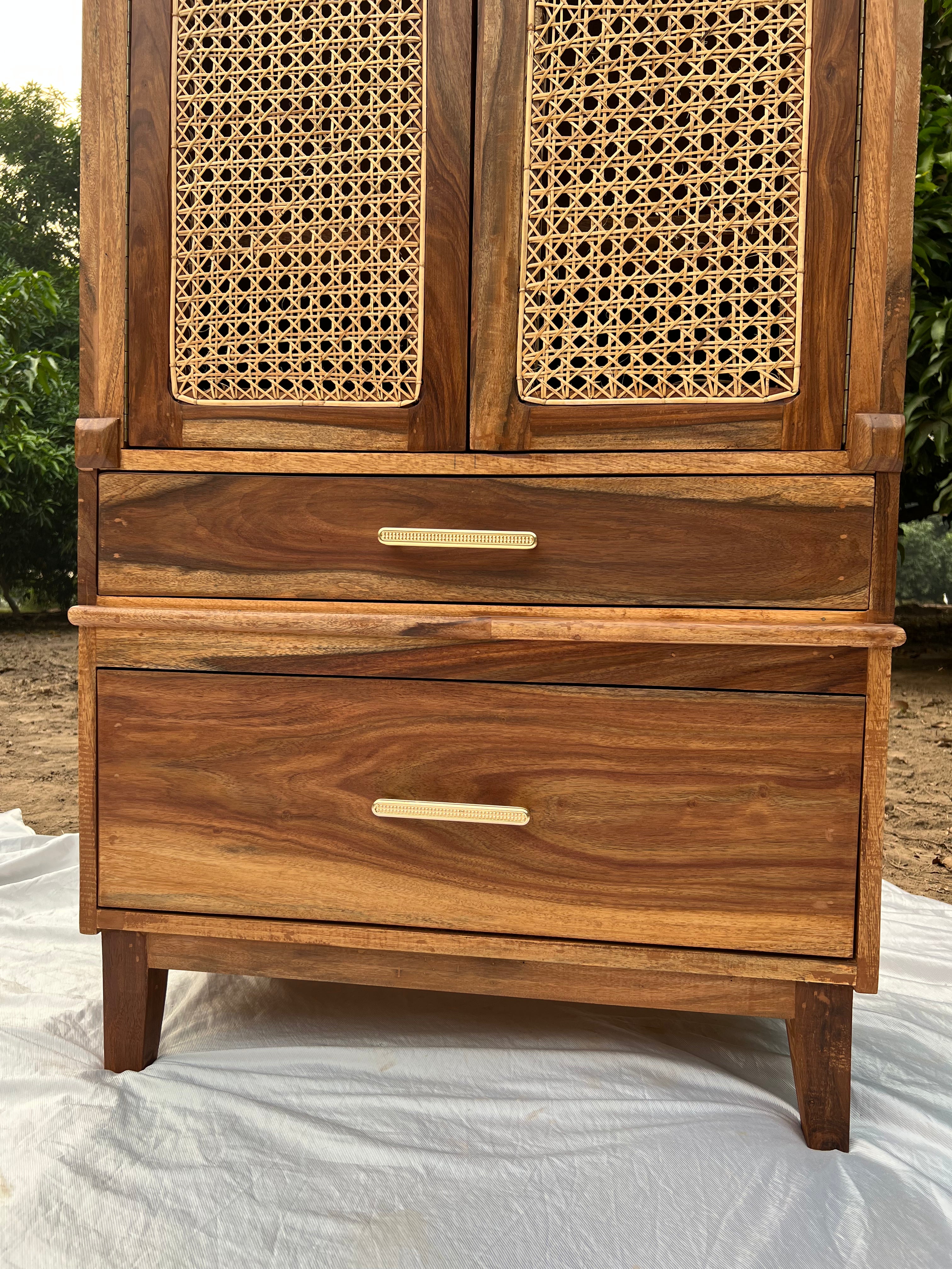 Close-up of wood grain and cane weave texture on rattan cupboard