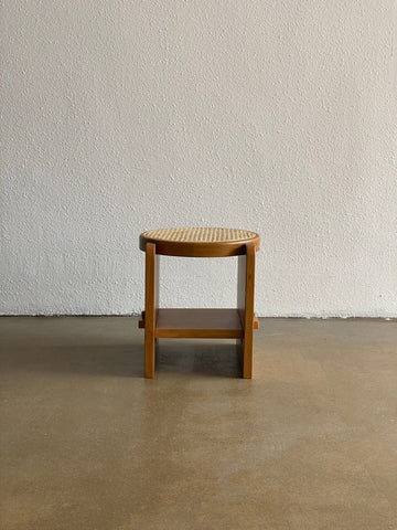 "Close-up of woven rattan base on Loom side table"