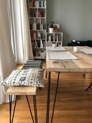 Dining table close-up showing wood grain and finish