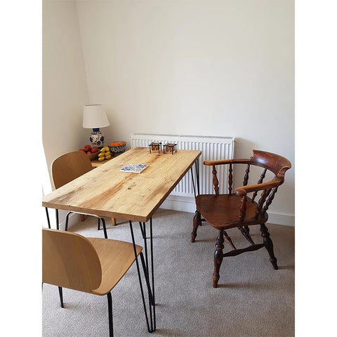 Dining table styled in dining room setting