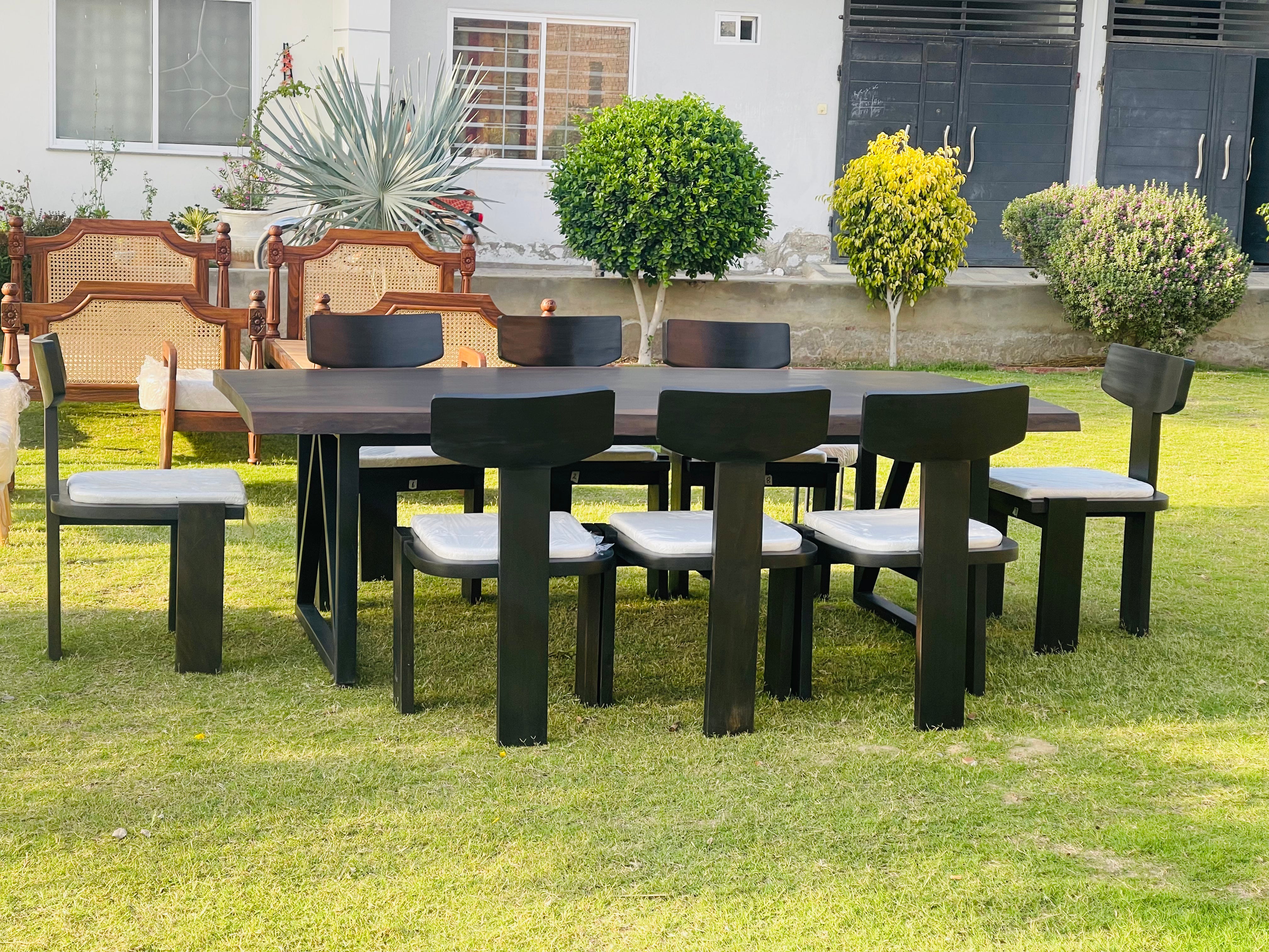 Extended dining table styled with place settings