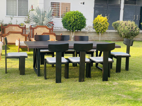 Extended dining table styled with place settings