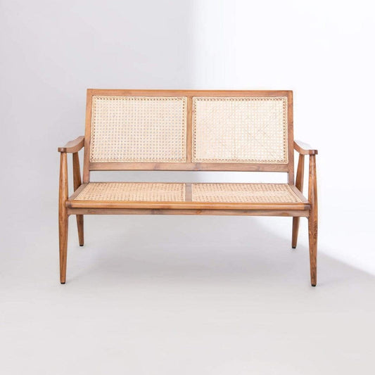 Front view of Rattan Craft bench showing handwoven seat