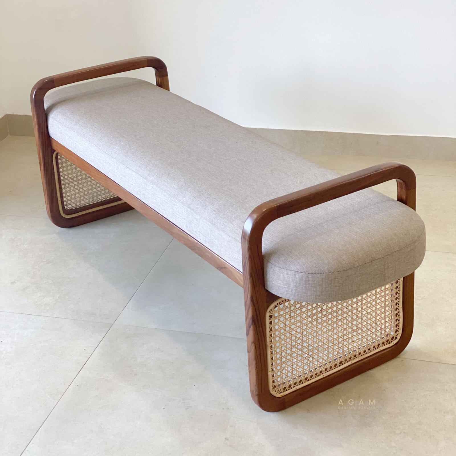 Front view of Weavella bench showing rattan seat
