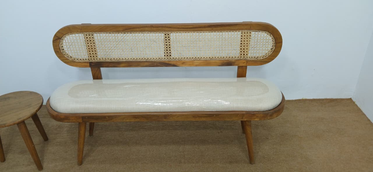Handcrafted solid wood bench with natural rattan seat