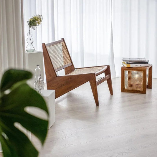 "Handwoven rattan top of Canella wood side table, glossy finish"