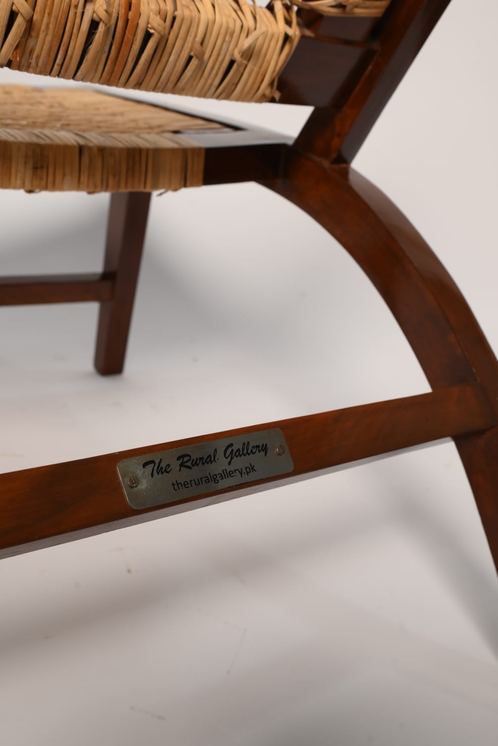 "Legacy rattan chair from behind"