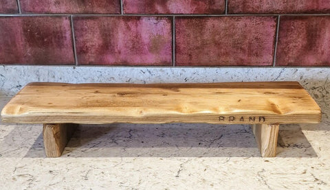 Live edge bathroom shelf riser, angled view