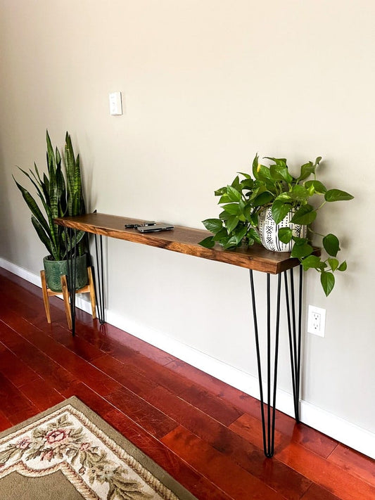 Live edge console table close-up, natural wood grain