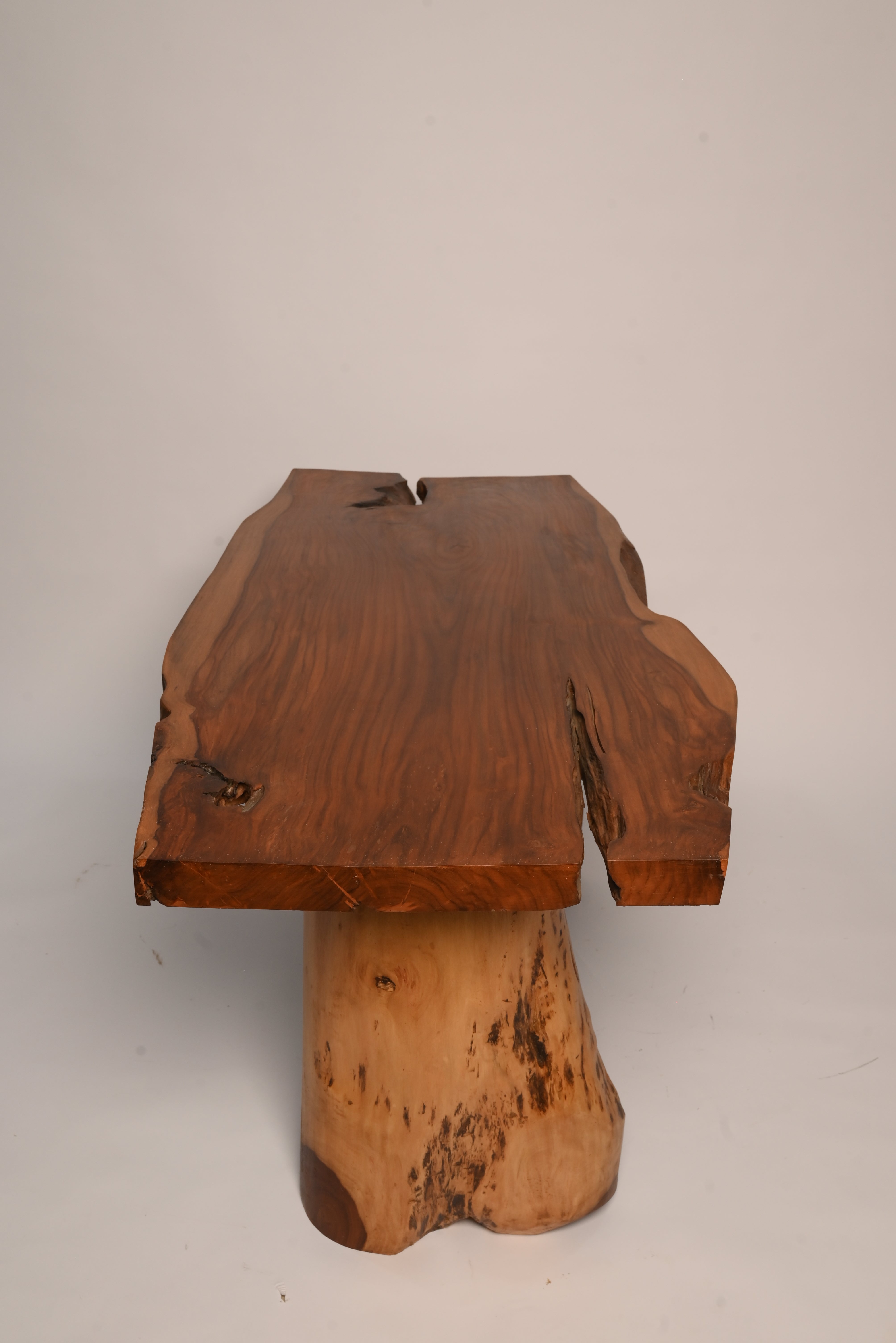 "Live edge sheesham dining table with glossy finish"