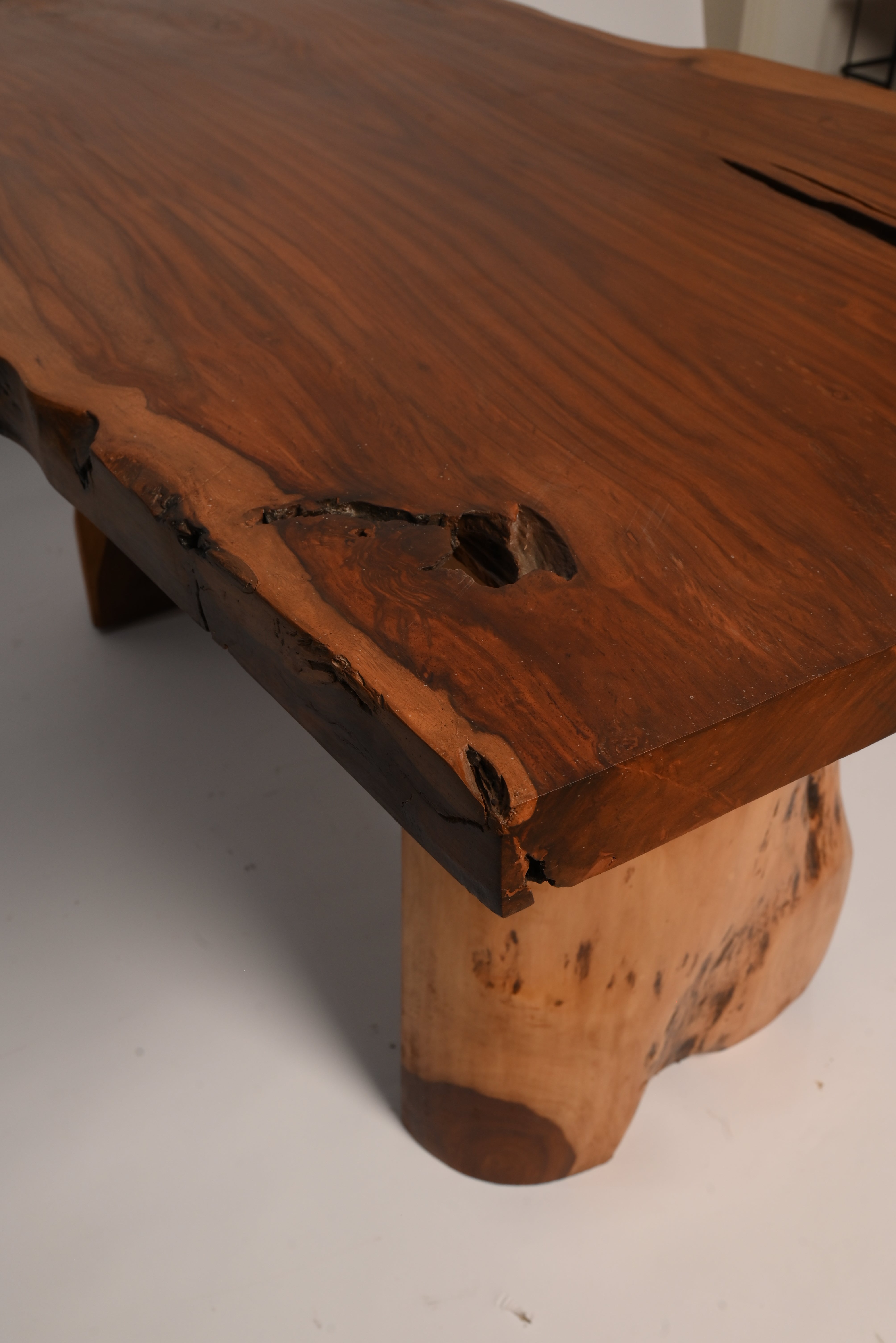 "Live edge sheesham dining table with place settings"
