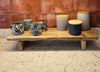 Live edge shelf riser styled with plants