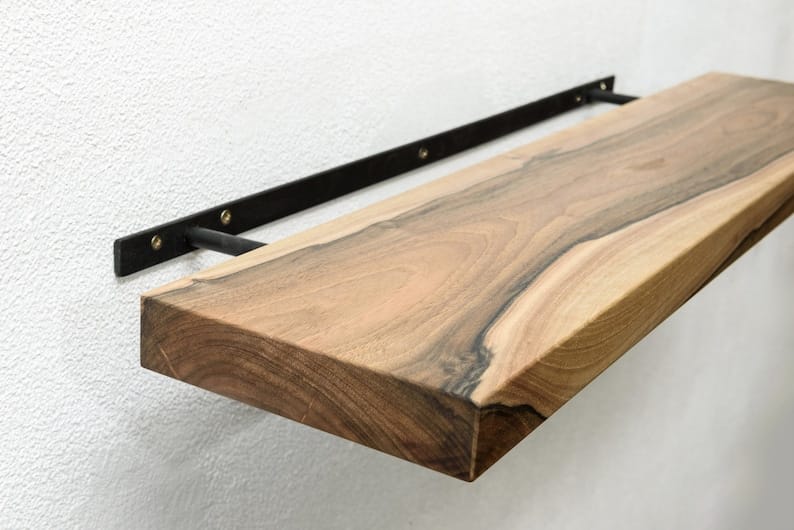 Live edge shelf styled with decor items