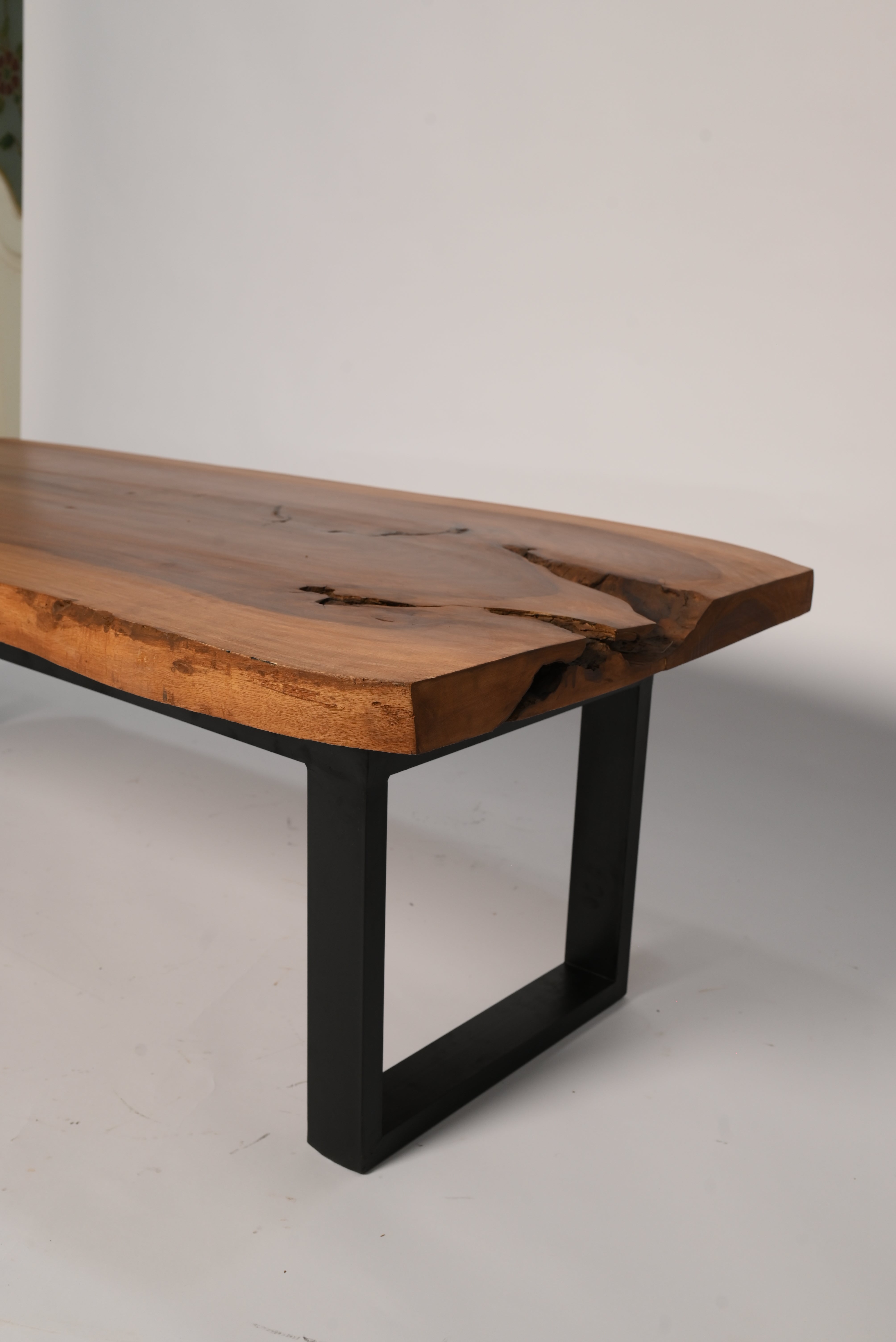 Live edge table edge detail, natural bark line