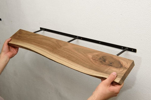 Live edge wall shelf in living room setting