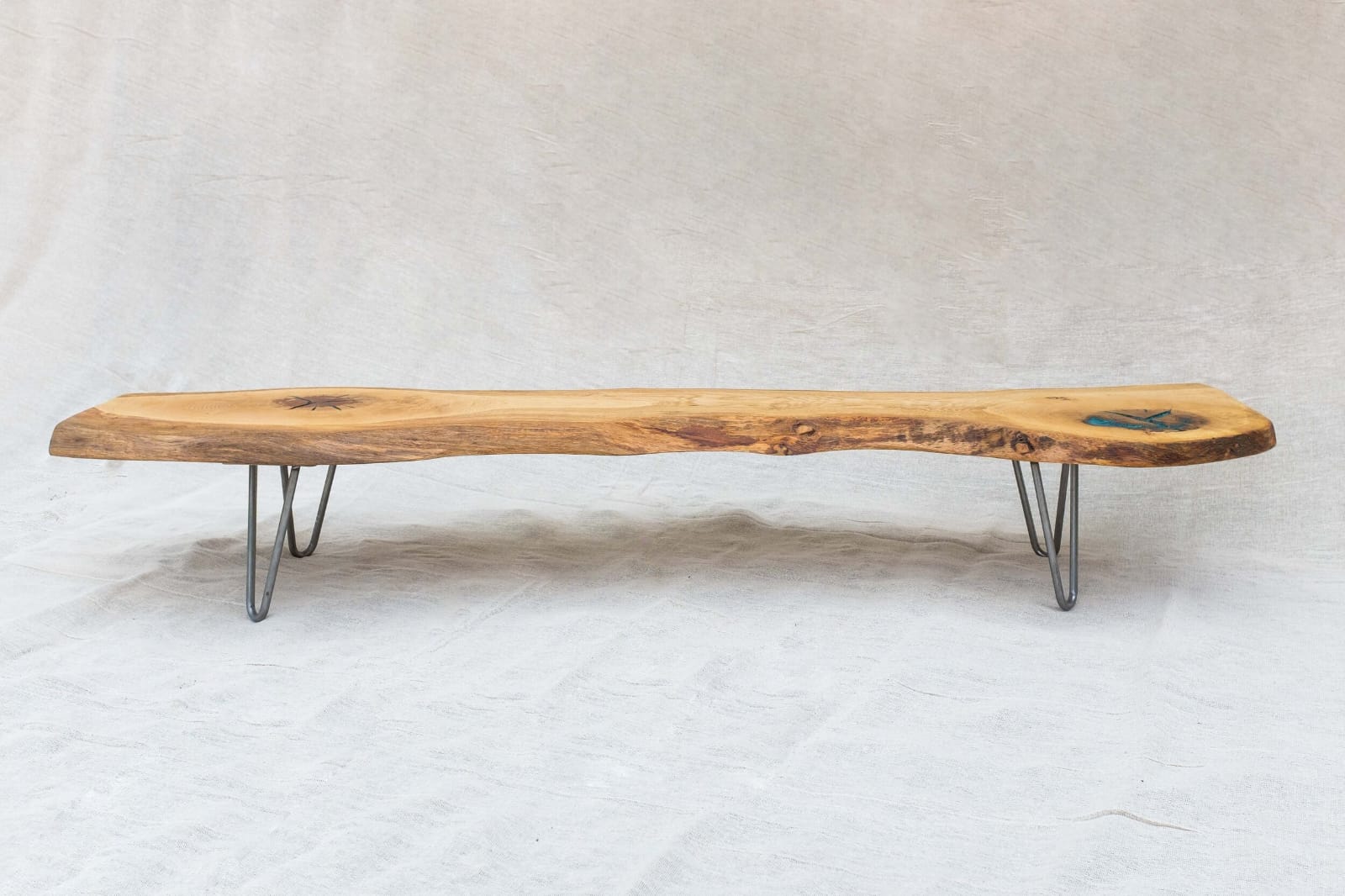 Live edge wood bench styled with plants