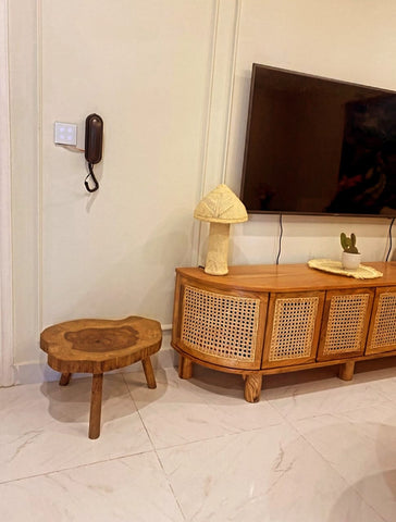Live edge wood planter styled with potted plant