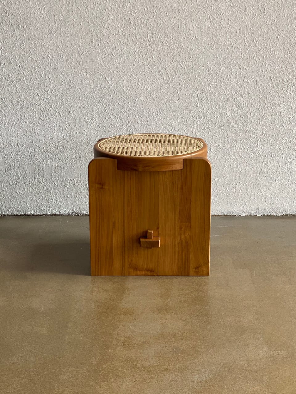 "Loom side table used as bedside table"