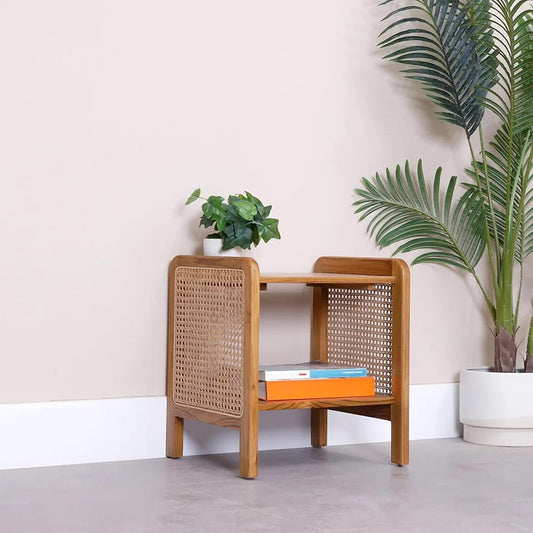"Mesh rattan side table with woven cane design and Sheesham wood frame"