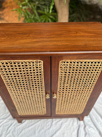 Moro rattan cabinet corner detail showing joinery and finish