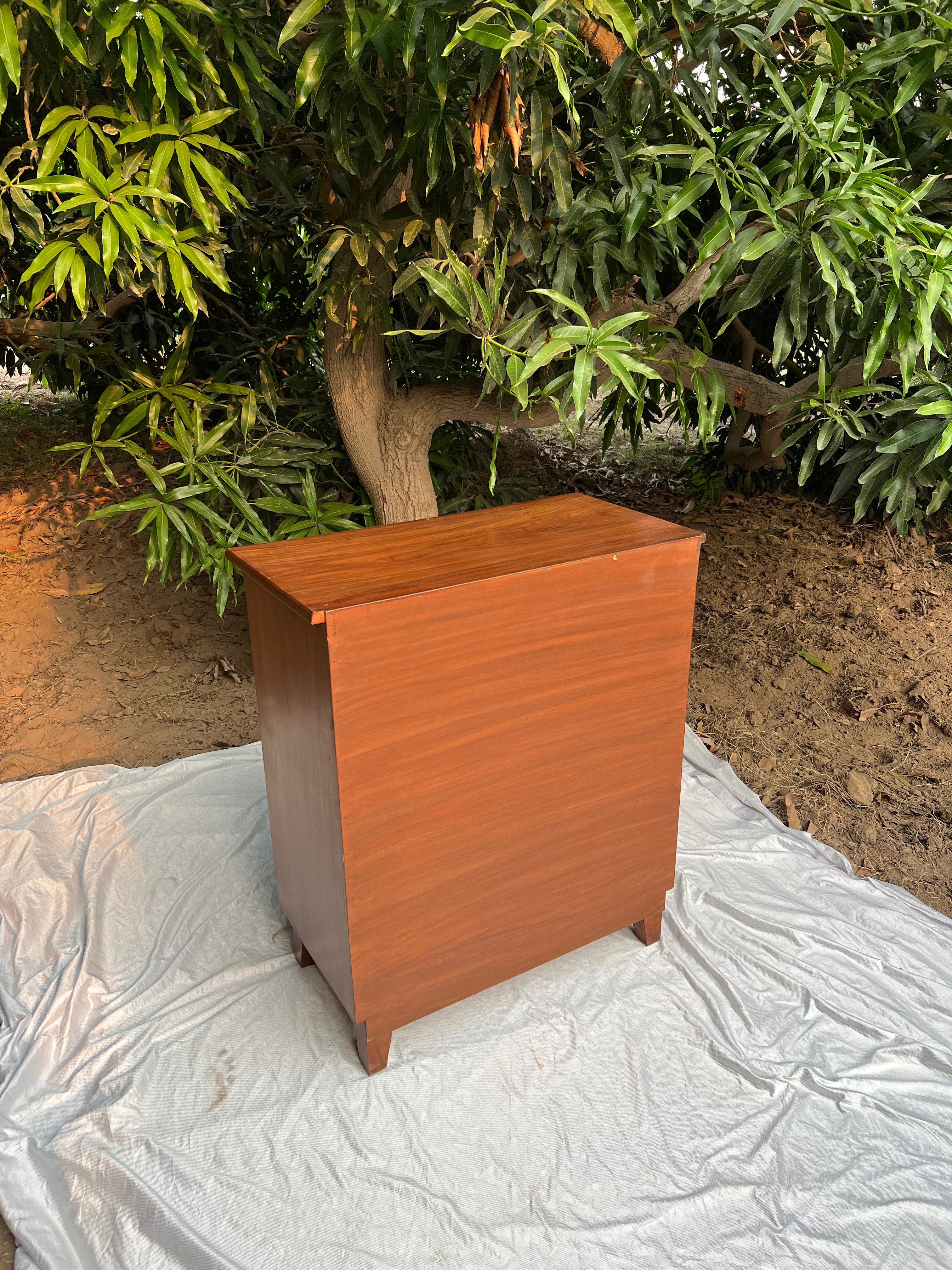 Natural cane cabinet styled in a living room setting