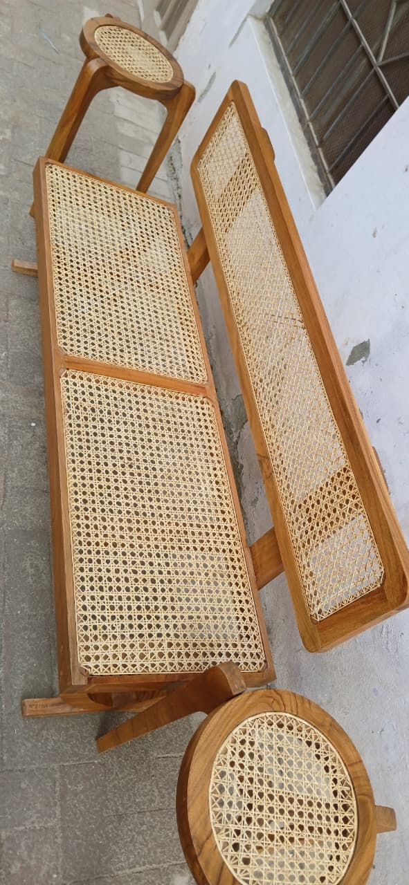 Rattan bench styled in a bedroom or cozy corner setting