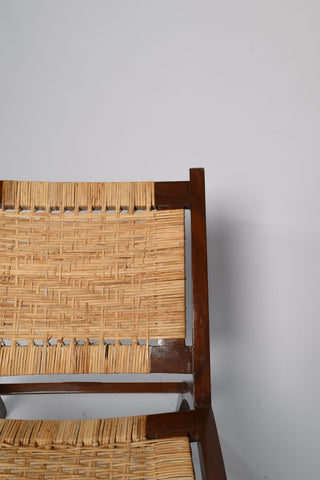 "Rattan chair close-up of woven seat"