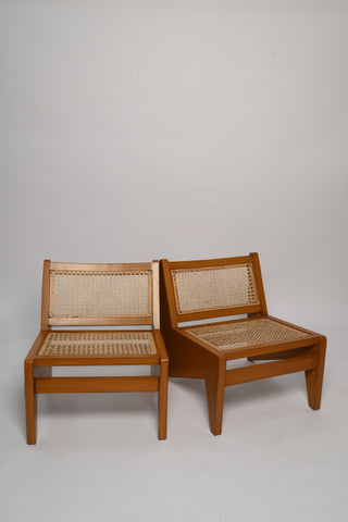 "Rattan lounge chair front view, glossy finish"