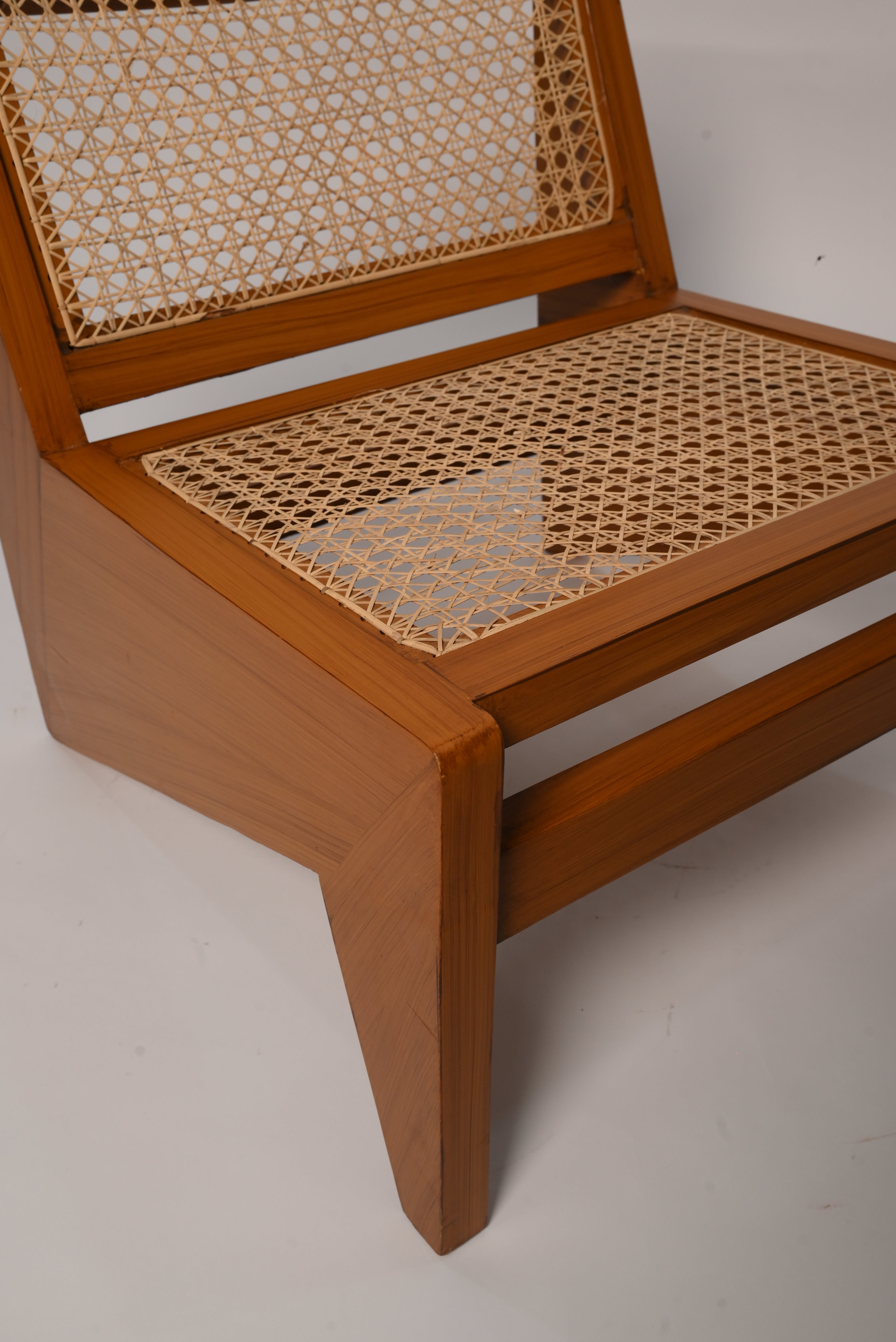 "Rattan lounge chair in matte finish, full view"