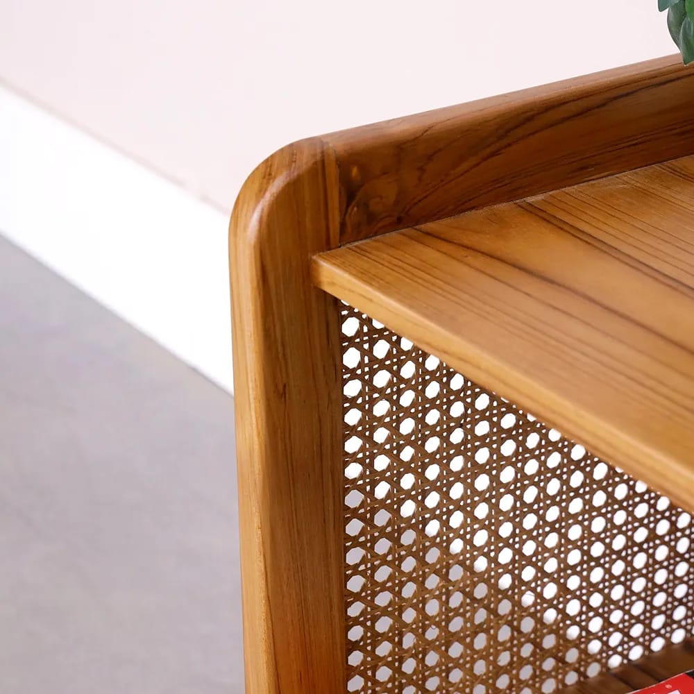 "Rattan mesh side table styled in living room corner"