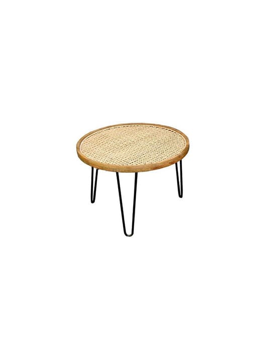 "Rattan nesting tables styled in living room decor"