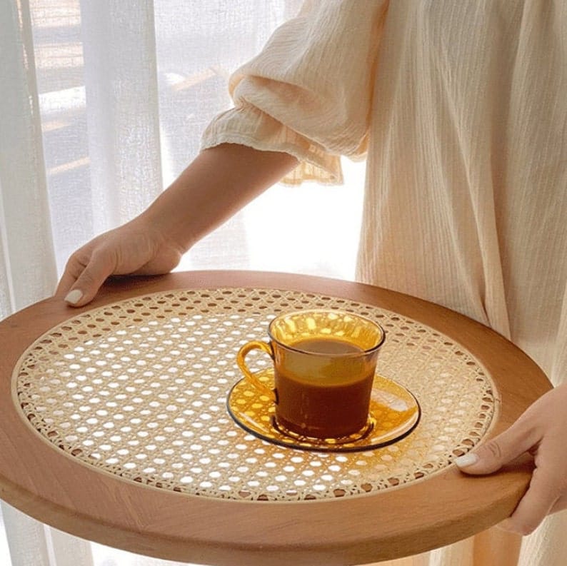 "Rattan tray styled on coffee table as decor"
