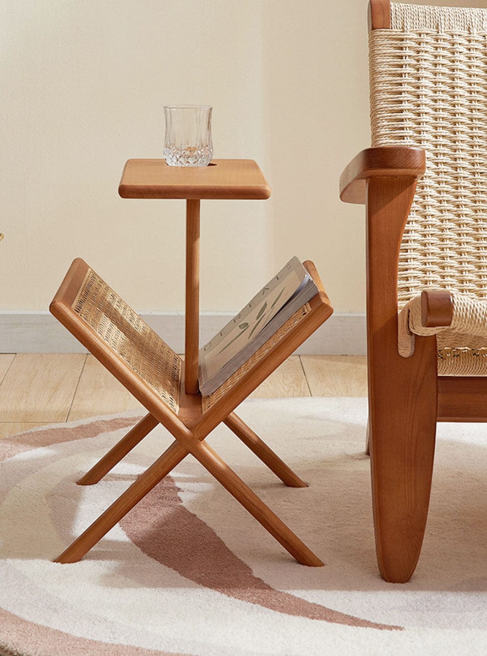 Side angle of Prestige table highlighting wood leg construction
