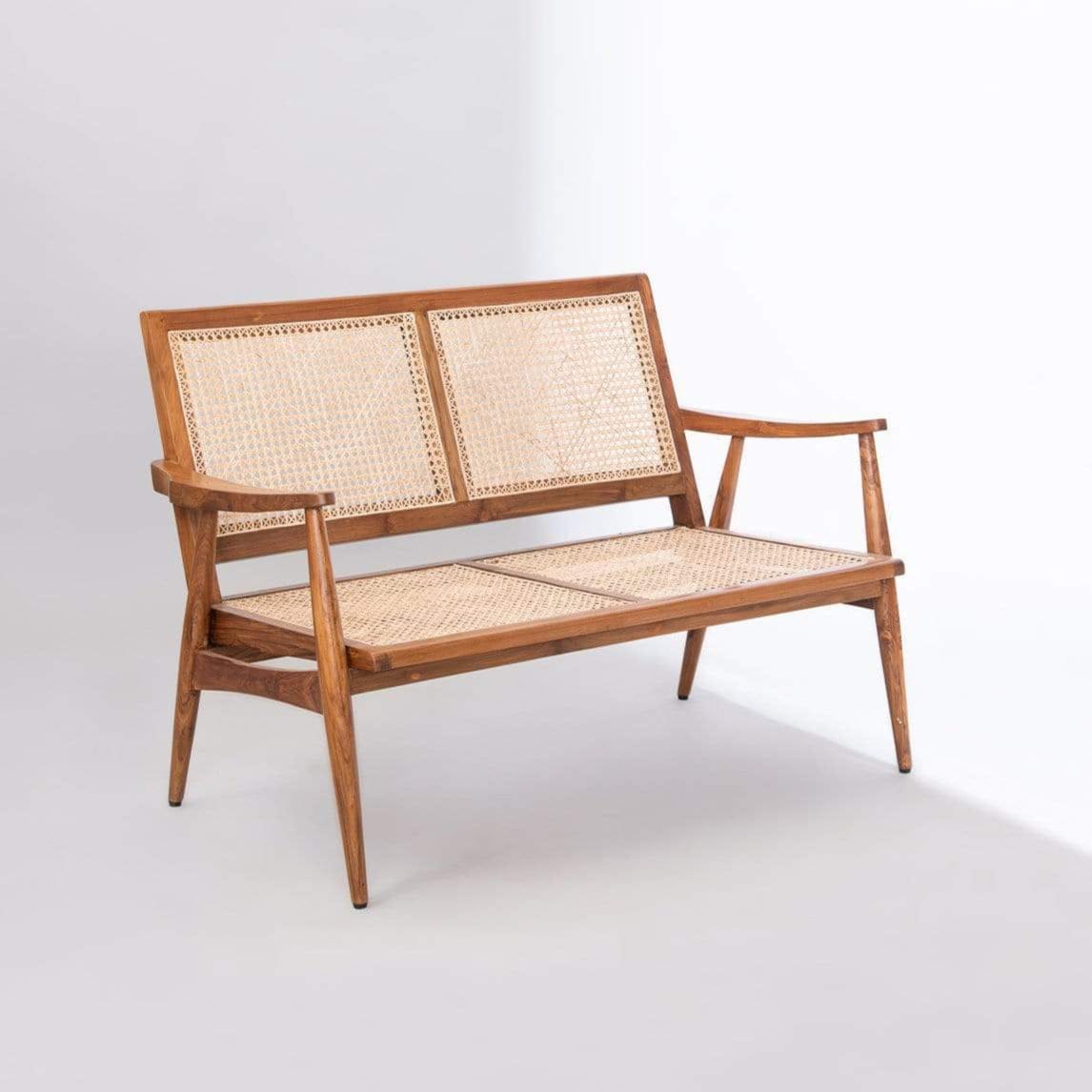 Side angle of Rattan Craft bench highlighting wood frame
