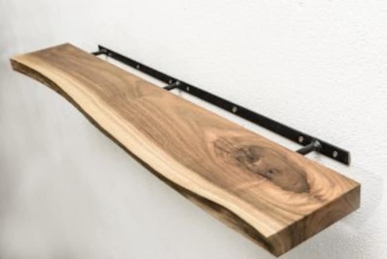 Solid wood floating shelf glossy finish detail