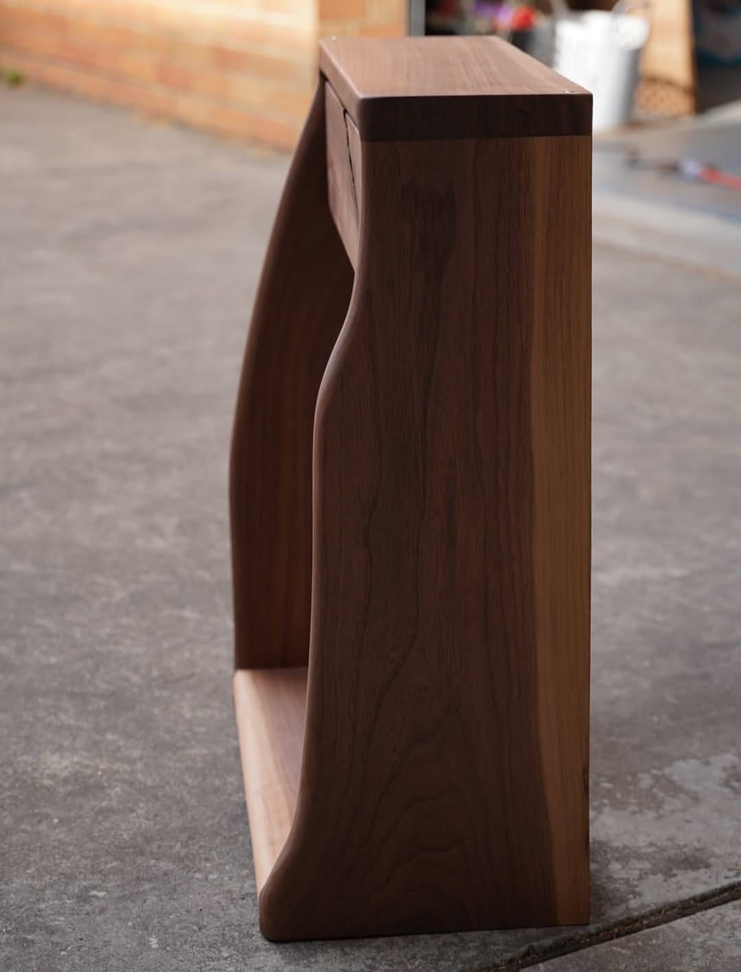"Solid wood side table side view"