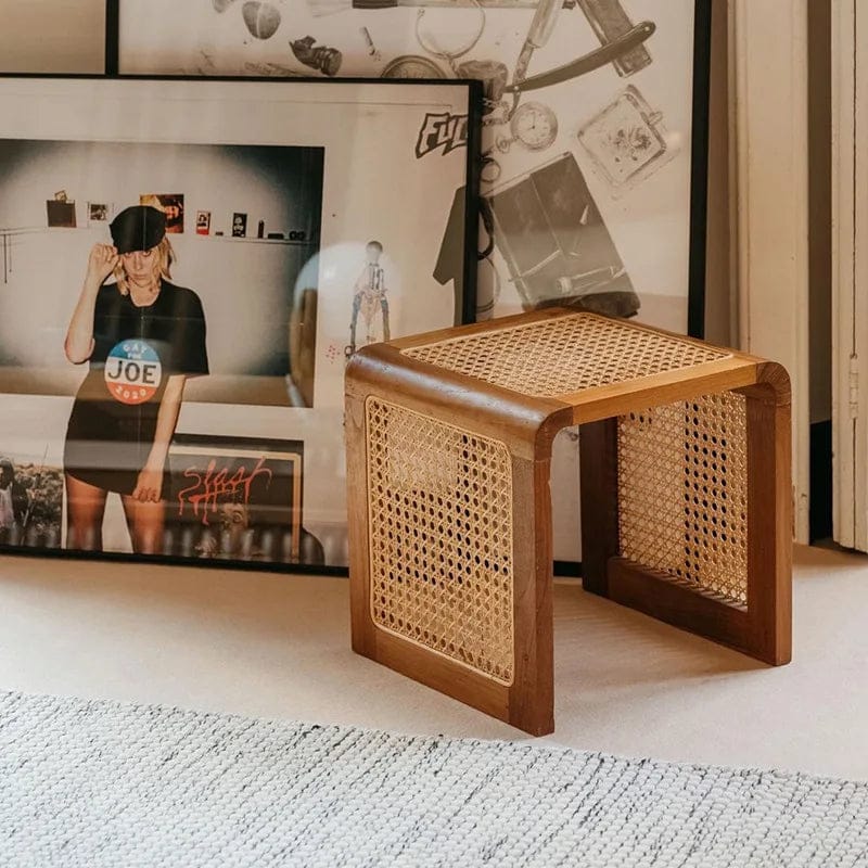 "U-shaped solid wood frame of Canella rattan side table close-up"