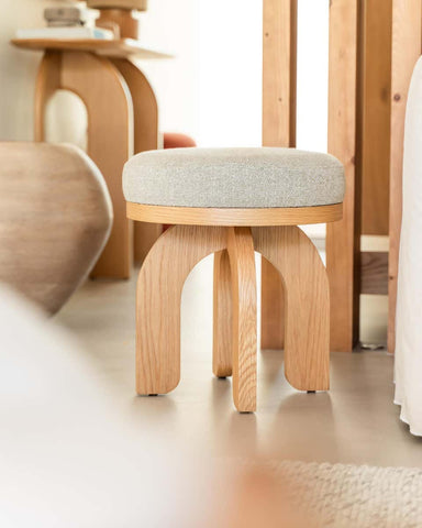 Velwood stool side view showing solid wood base