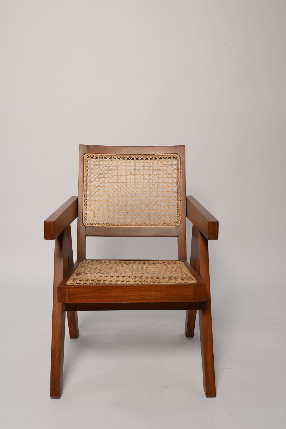 "Virsa rattan chair styled in room setting"
